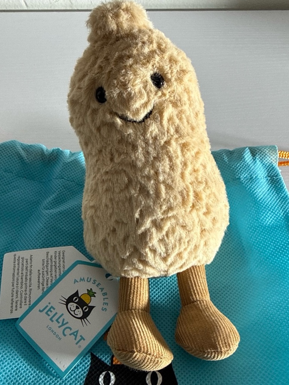 Jellycat Cream Plush Amuseables with Tan Corded Legs